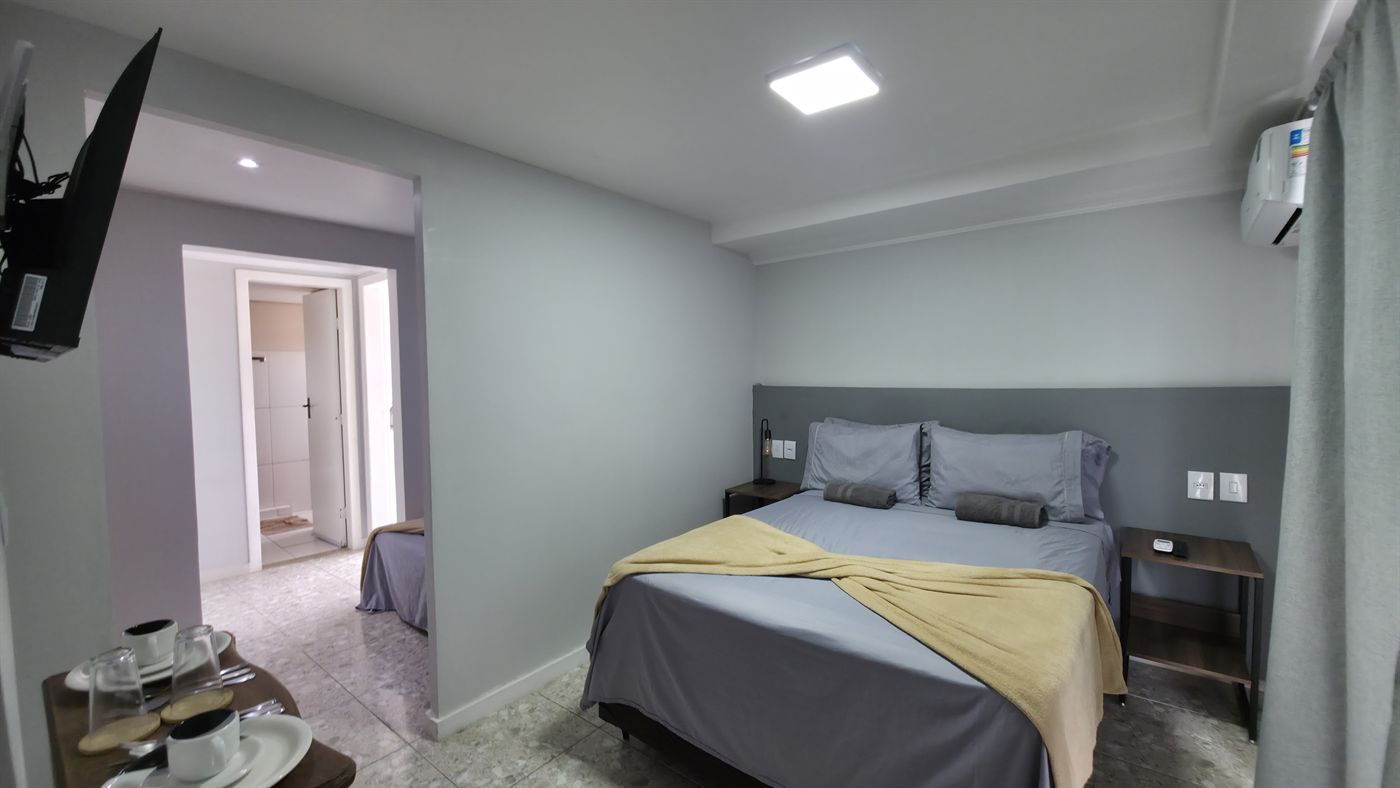 Suíte Rooftop — quarto com ar-condicionado